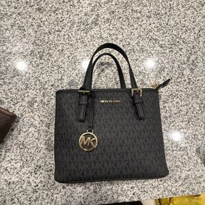 MICHAEL Michael Kors Black and Gold Satchel